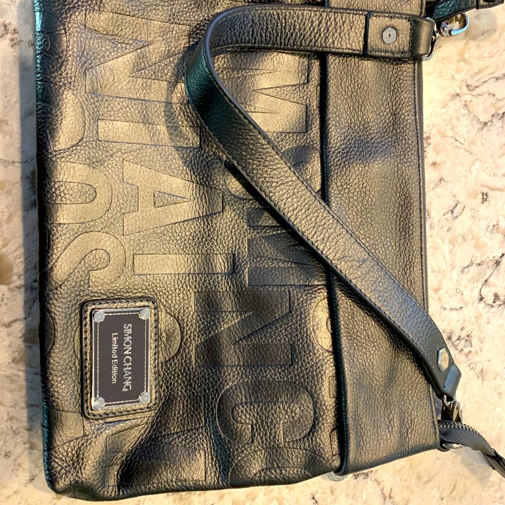 Simon Chang leather, silver handbag - like new